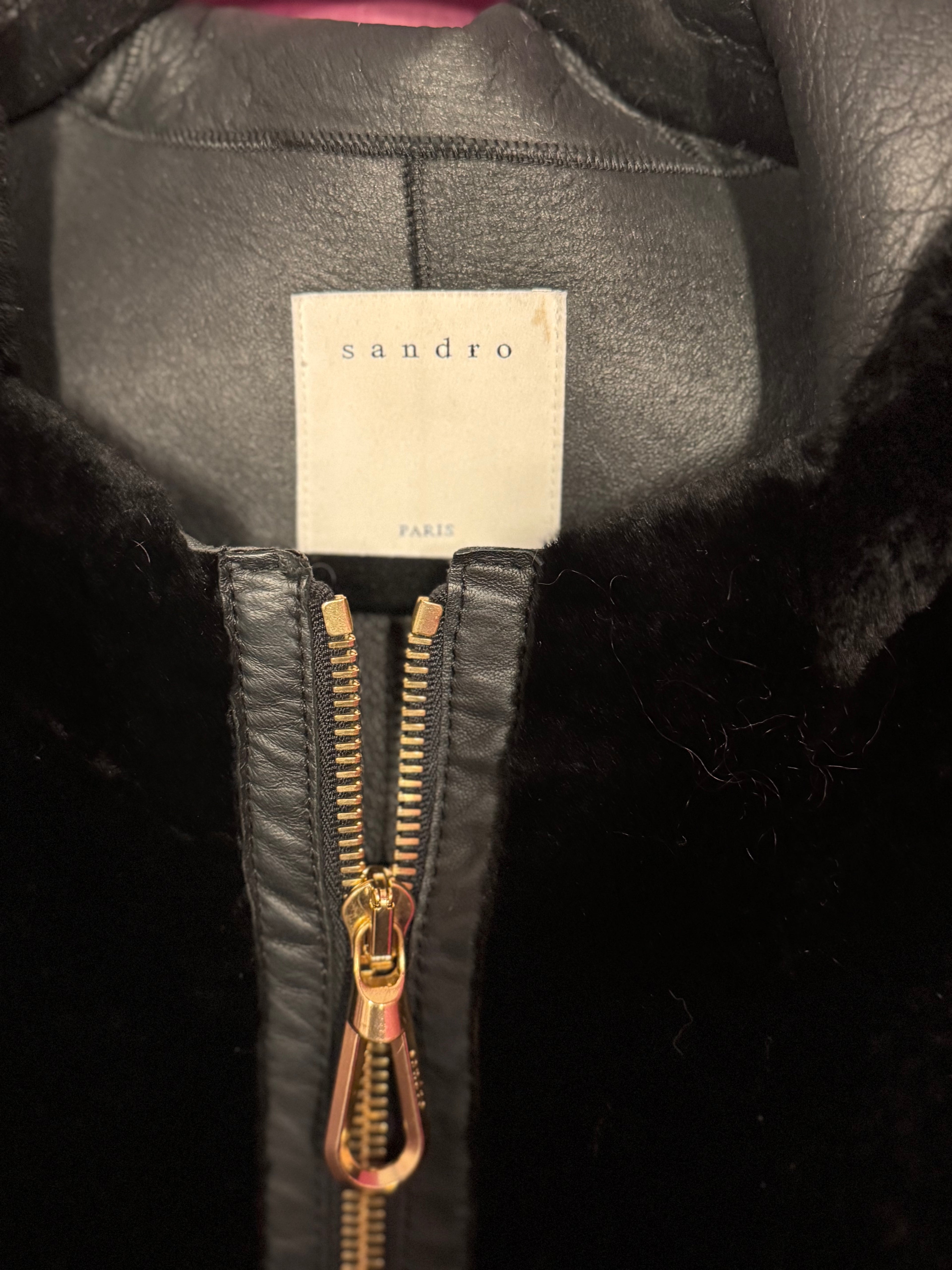 Manteau en cuir et fourrure