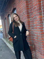 Manteau long noir en laine