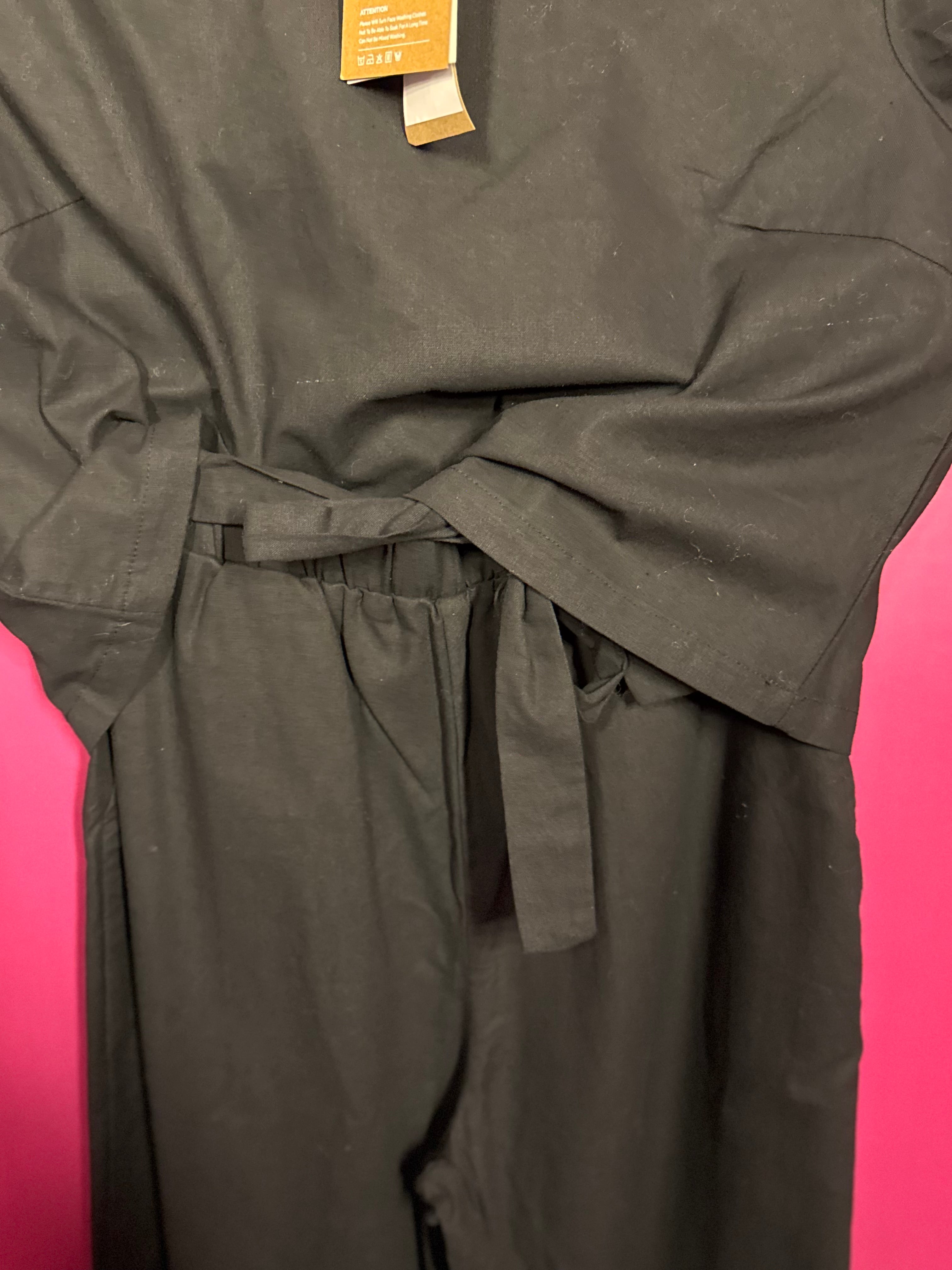 Ensemble noir fluide